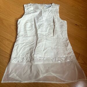 White sheer sleeveless blouse